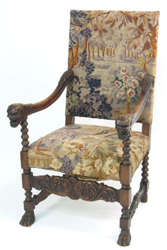 Appraisal: CHARLES II STYLE CARVED WALNUT AND FLORAL NEEDLEPOINT ARMCHAIR English