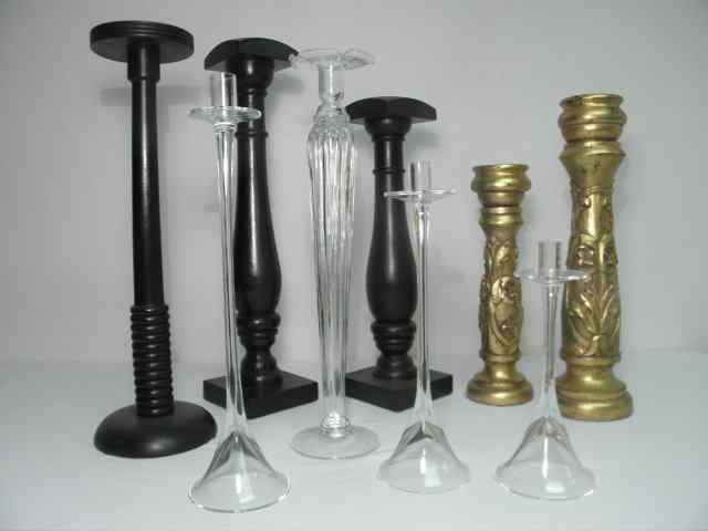 Appraisal: Lot of nine assorted decorative candlesticks Includes three matching graduated