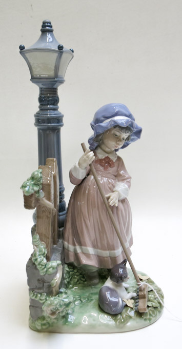 Appraisal: LLADRO PORCELAIN FIGURINE Fall Clean-Up sculptor Antonio Ramos issued retired