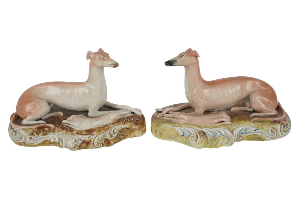 Appraisal: PAIR STAFFORDSHIRE POTTERY GREYHOUND FIGURESunmarked Condition each with repair to