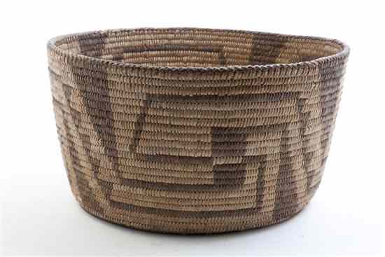 Appraisal: A Pima Coiled Basket having a three pointed star at