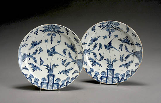 Appraisal: Pair of Delft Blue and White 'Bird in Foliage' Chargers