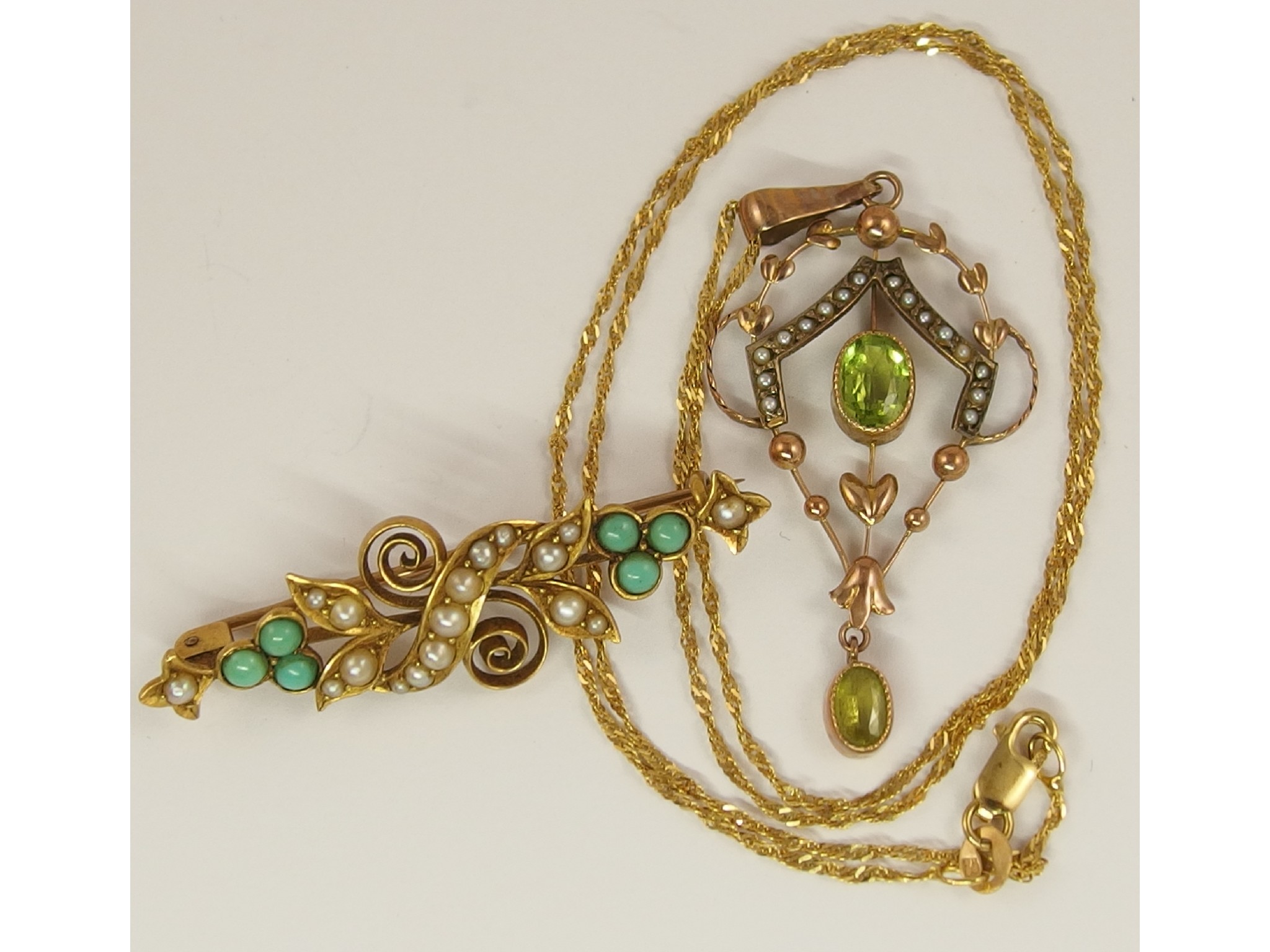 Appraisal: An ct gold Edwardian turquoise and pearl brooch and a