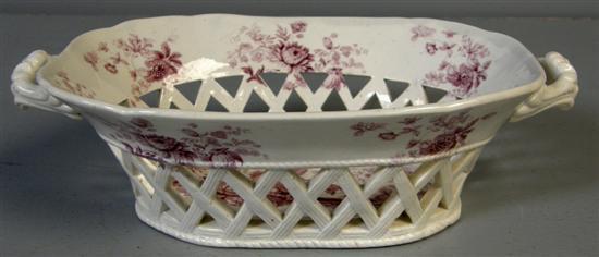 Appraisal: English pierced pottery basket with puce floral decoration