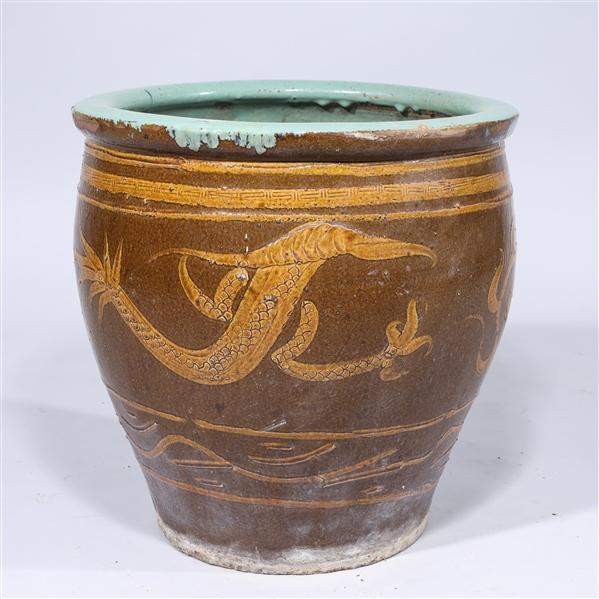 Appraisal: Chinese ceramic dragon jar some wear drilled for usage as