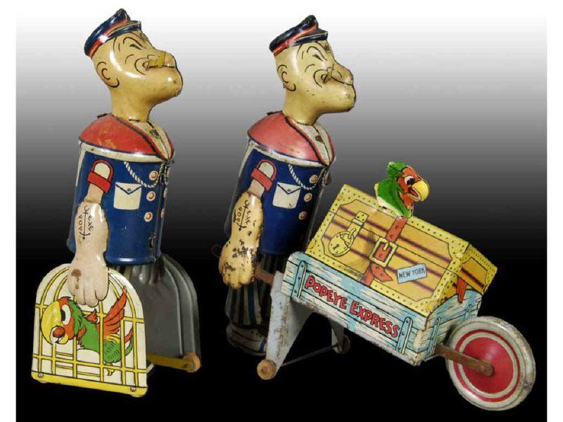 Appraisal: Lot of Marx Tin Wind-Up Popeye Toys Description Both ''