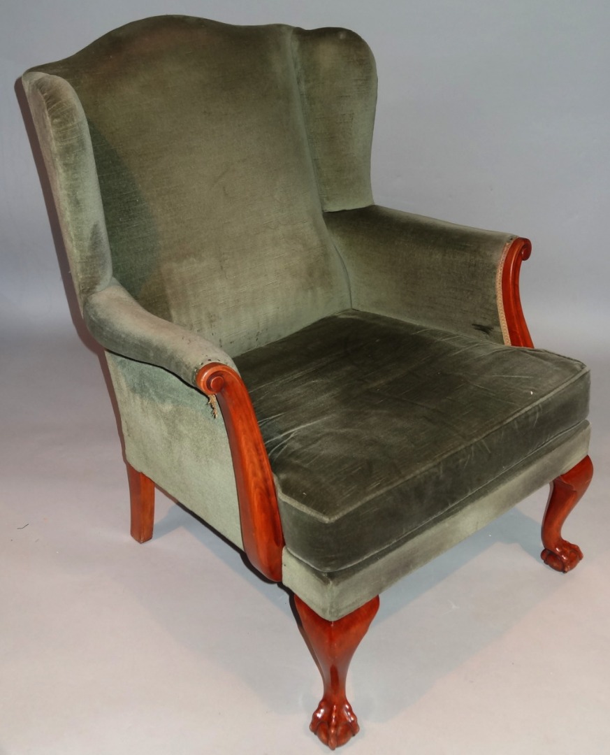 Appraisal: A thC George III style wing armchair in green material