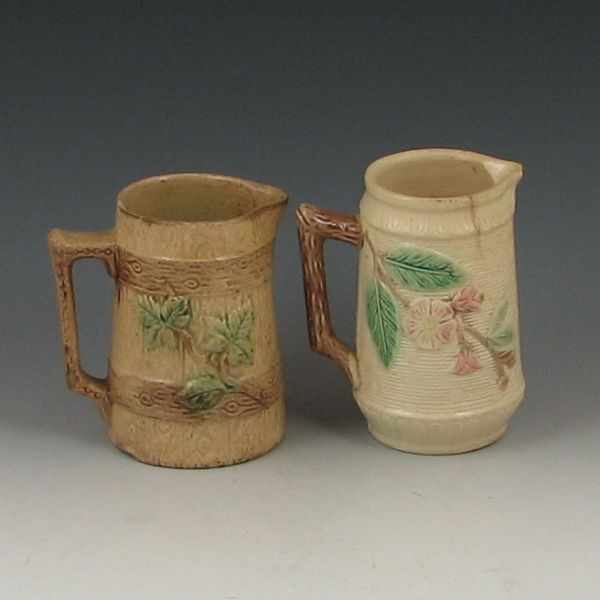 Appraisal: Two Majolica Pitchers left unmarked ''h bruise on the handle