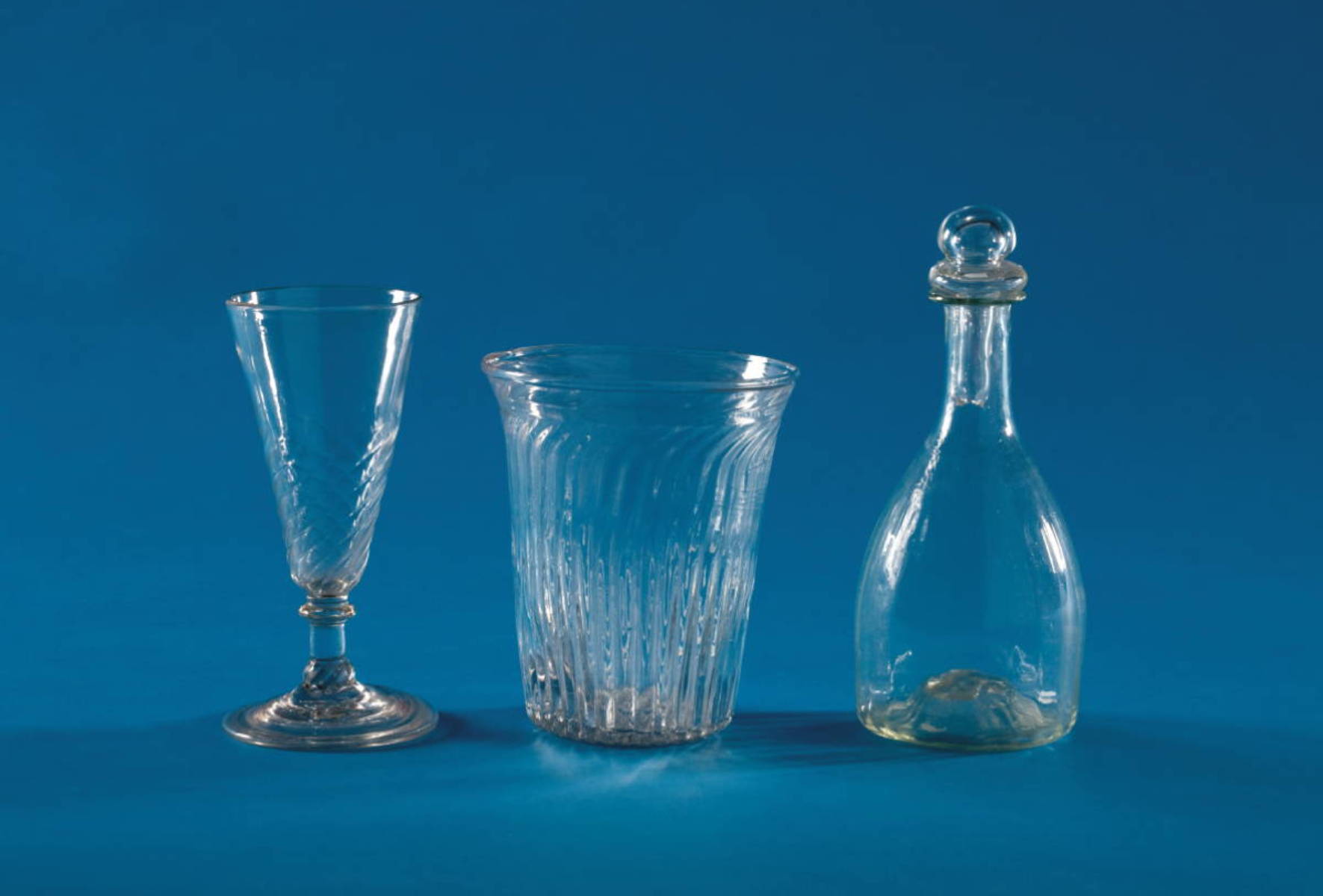 Appraisal: GROUP OF BLOWN-MOLDED COLORLESS GLASS WARES Comprising a GIII- type