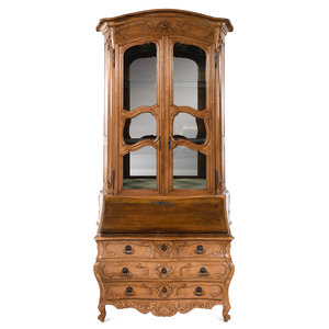 Appraisal: A French Provincial Style Walnut Secretary Bookcase th Century the