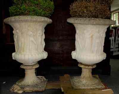 Appraisal: A pair of Haddonstone campana shaped urns moulded with Classical