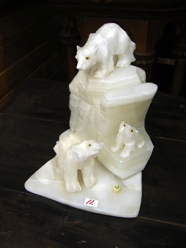 Appraisal: A SCULPTED WHITE ONYX FIGURAL TABLE LAMP in the form