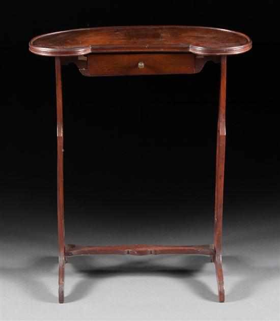 Appraisal: Edwardian mahogany kidney-shaped stand early th century single drawer with