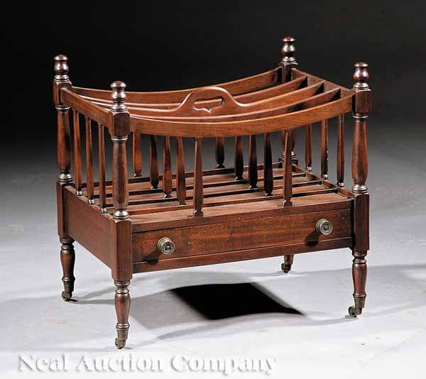 Appraisal: An Antique Mahogany Canterbury spindled divided compartments turned finialed uprights