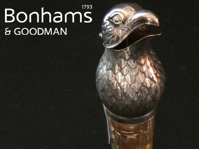 Appraisal: A Continental silver mounted wine stopper modelled as a bird's