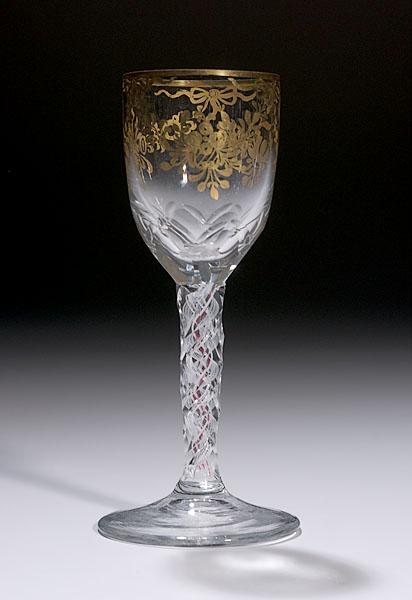 Appraisal: COLOR TWIST GILDED WINE GLASS WITH FACETED STEM probably English