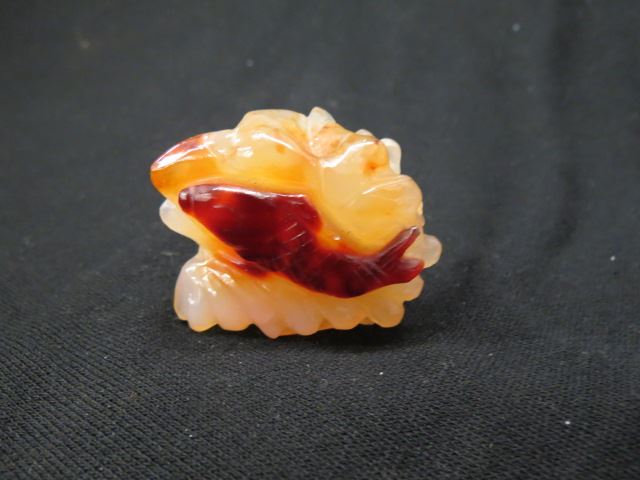 Appraisal: Chinese Carved Carnelian Figurine of Fishin waves x