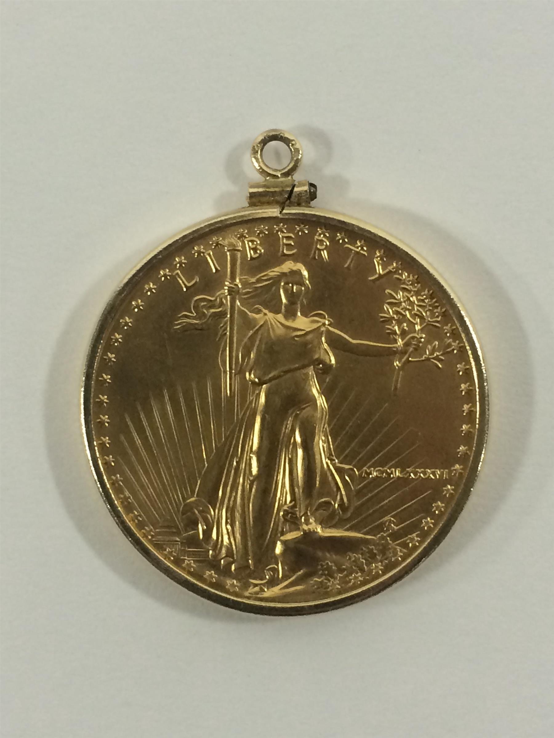 Appraisal: ONE-OUNCE PROOF GOLD AMERICAN EAGLE COIN PENDANT American MCMLXXXVI in