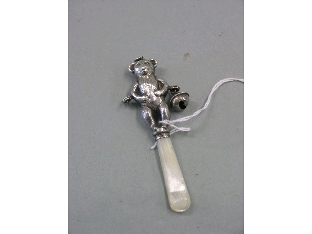 Appraisal: An Edwardian silver baby's rattle in the form of a