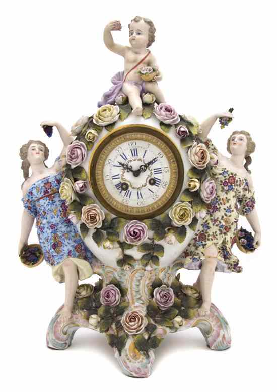 Appraisal: A German Porcelain Figural Clock circa having a putto above