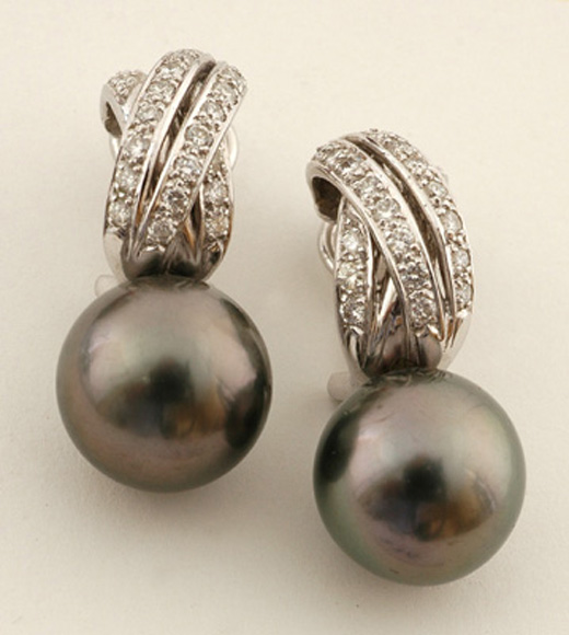 Appraisal: A pair of Tahitian pearl and diamond earrings Each round