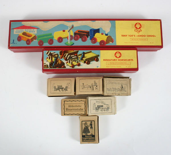 Appraisal: German wooden toys Erzgebirge miniatures eight boxed sets dozens of