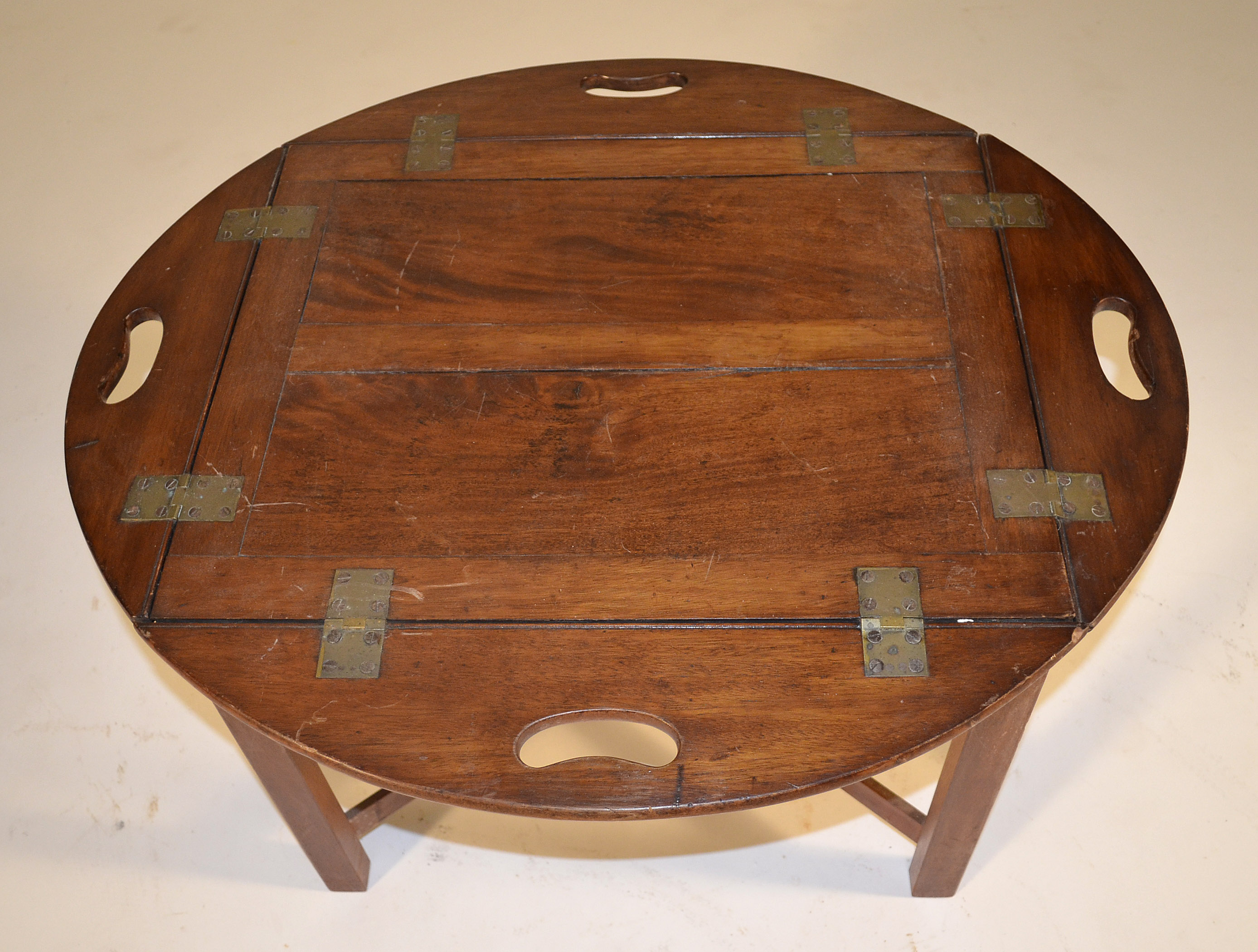 Appraisal: DIMINUTIVE BUTLER'S TRAY TABLE th CenturyIn mahogany Block legs with