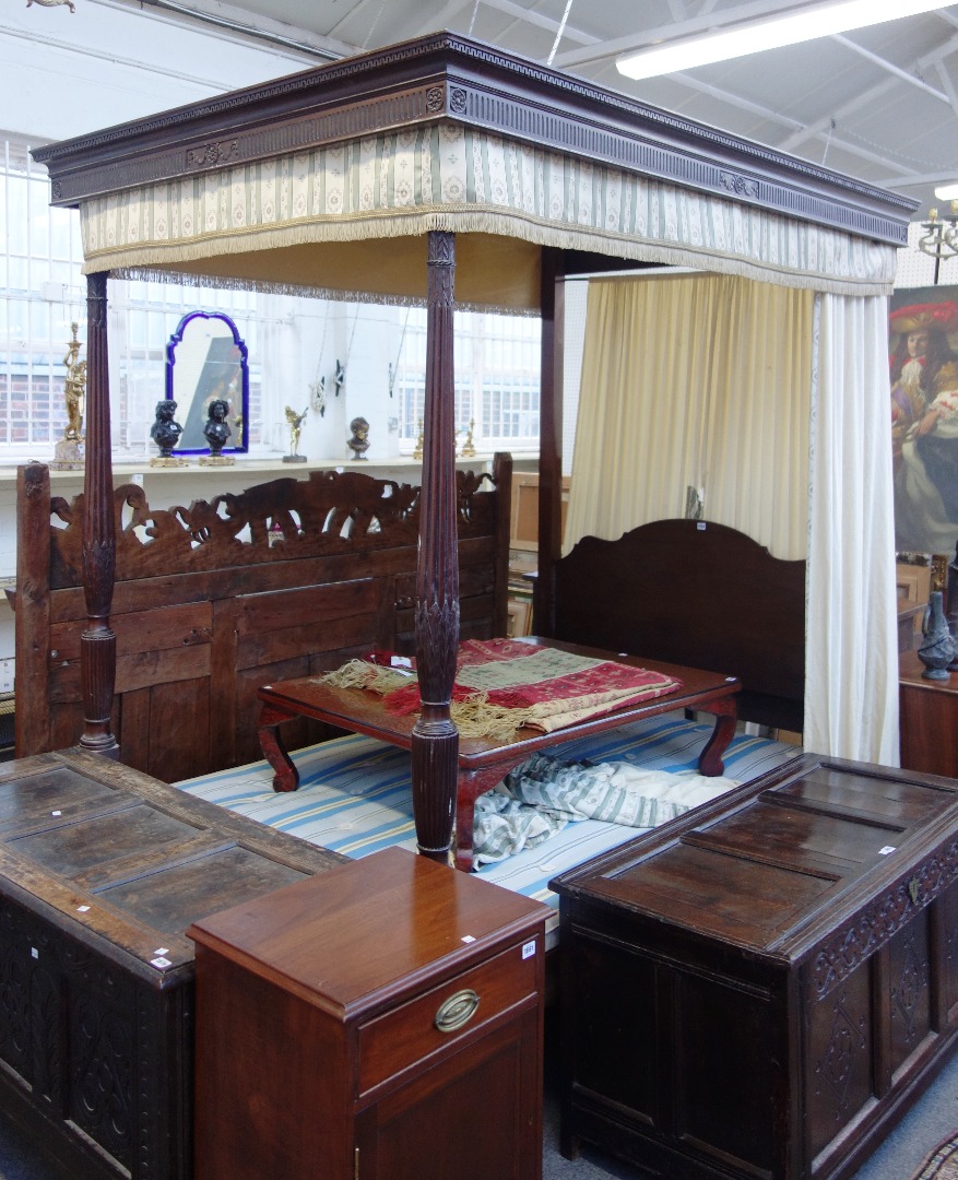 Appraisal: A mahogany four poster bed with reeded columns cm wide