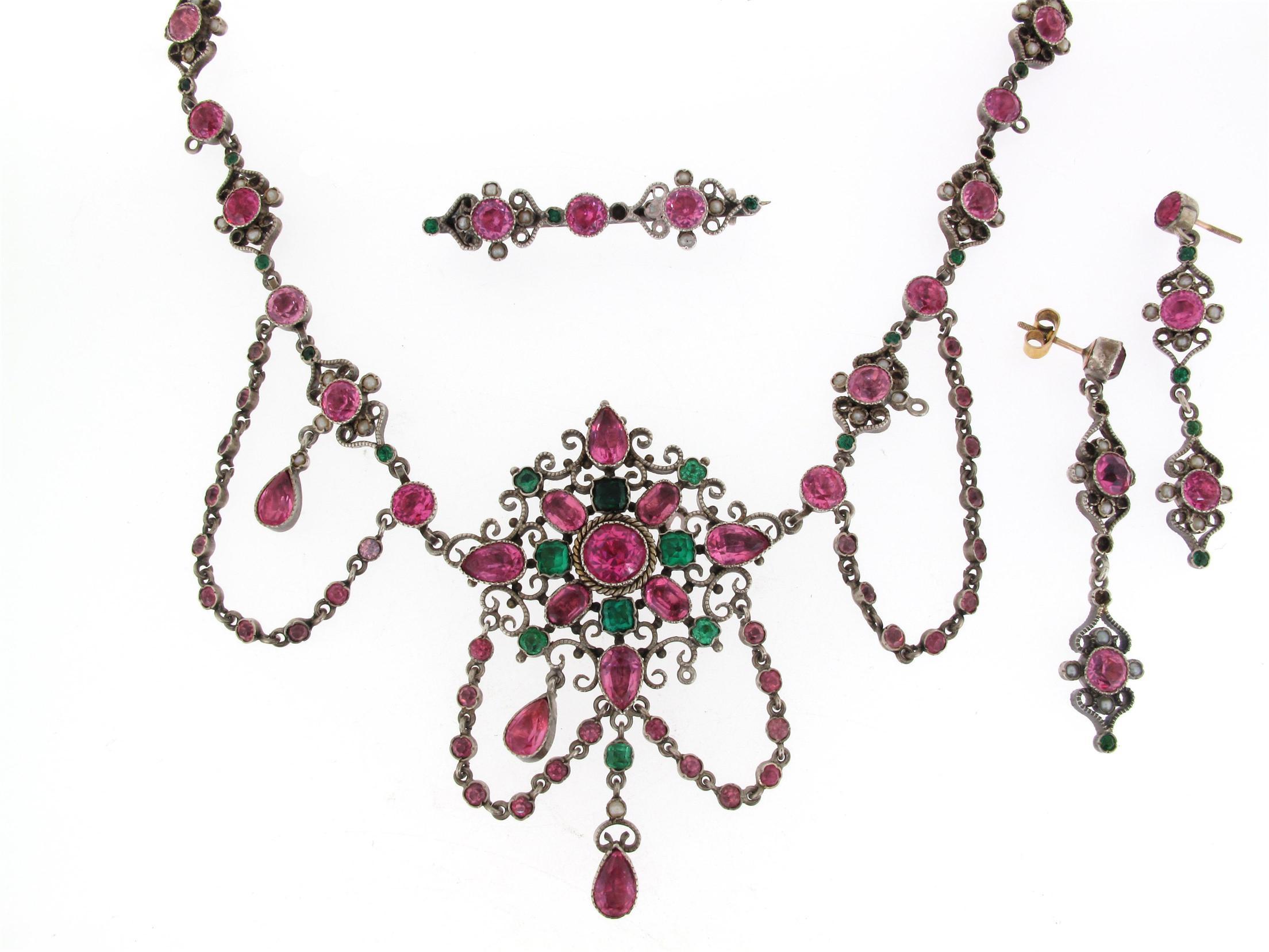 Appraisal: A necklace set with foil backed pink and green paste