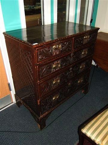 Appraisal: An antique oak chest of two short and three long