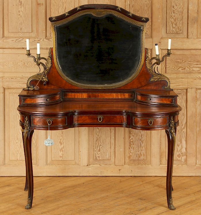 Appraisal: MAHOGANY DRESSING TABLE MANNER FRANCOISE LINKE A Louis XVI style