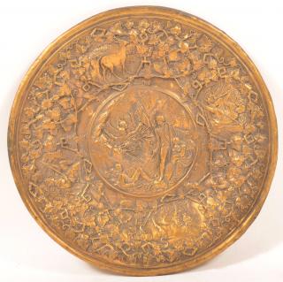 Appraisal: th Century brass Plate with Embossed Scenes Colonial figure with