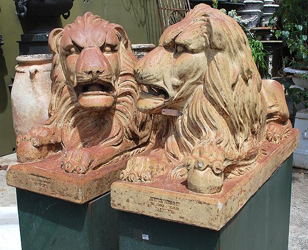 Appraisal: A FINE PAIR OF TH CENTURY ENGLISH GLAZED TERRACOTTA LIONS