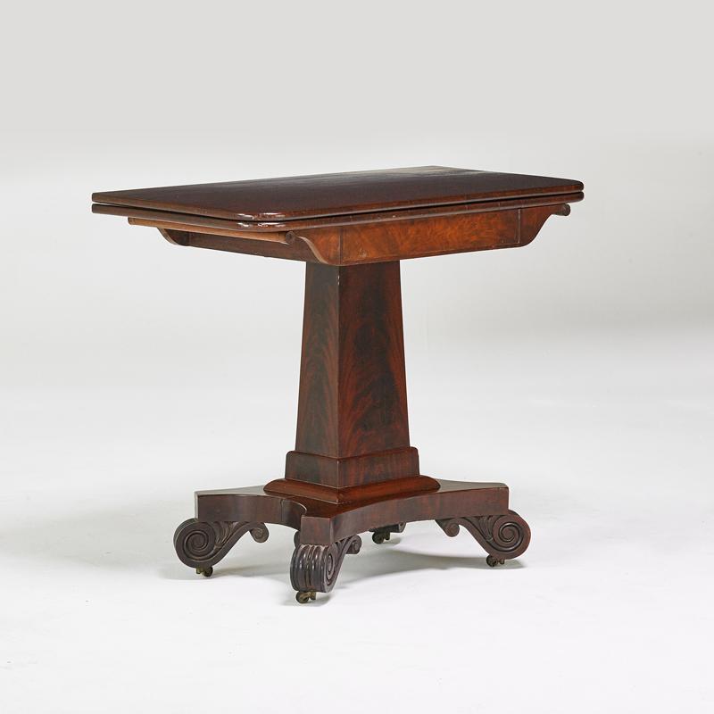 Appraisal: EMPIRE Card table on casters USA th c Mahogany brass