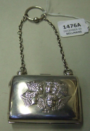 Appraisal: A silver purse Birmingham by Henry Matthews embossed with putti