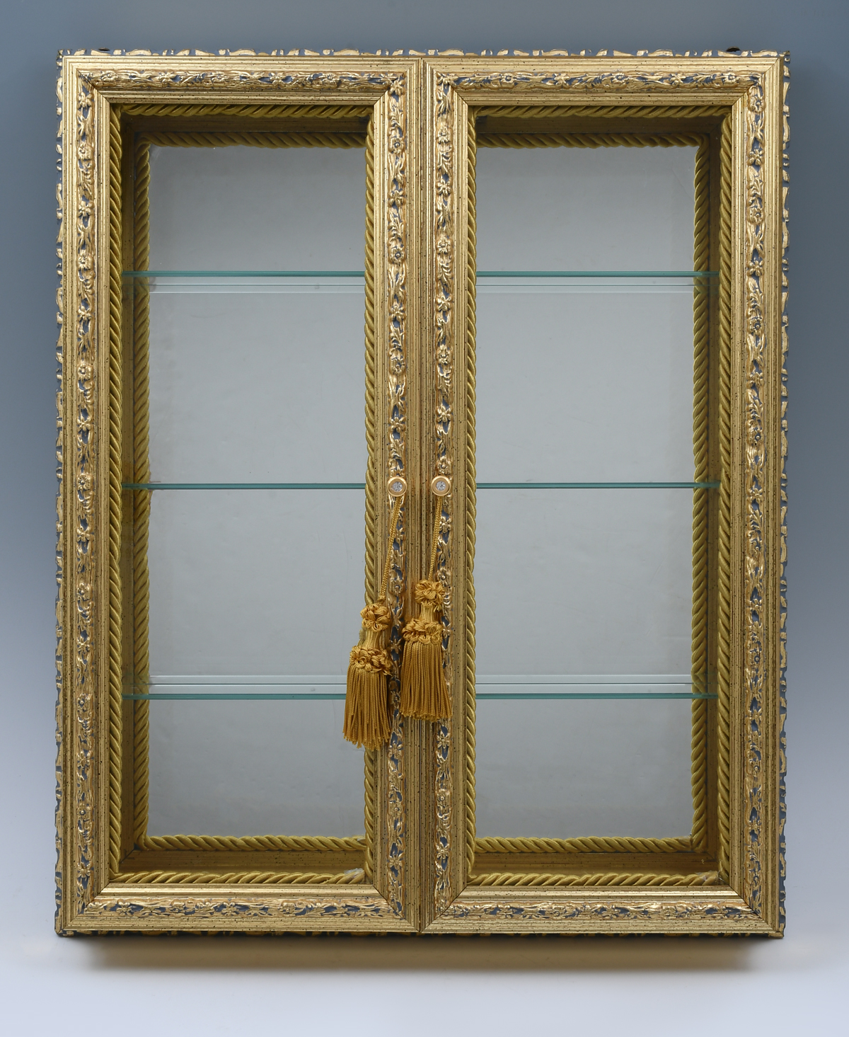 Appraisal: GILT ITALIAN DIMINUTIVE HANGING WALL VITRINE Gilt Italian wall vitrine