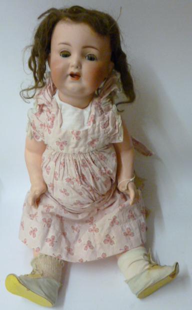 Appraisal: An Armand Marseille bisque head doll sleeping blue glass eyes