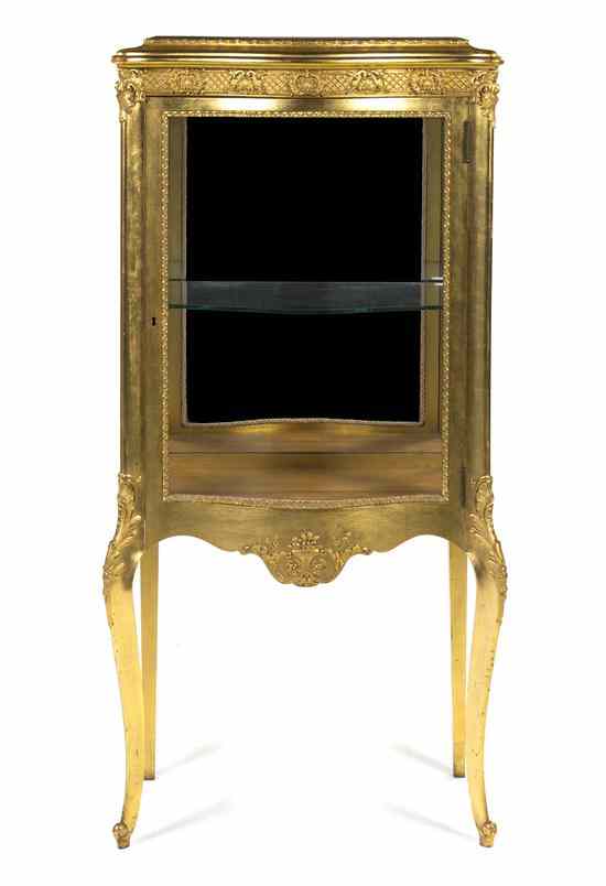 Appraisal: A Giltwood Vitrine Cabinet having carved decoration throughout with a