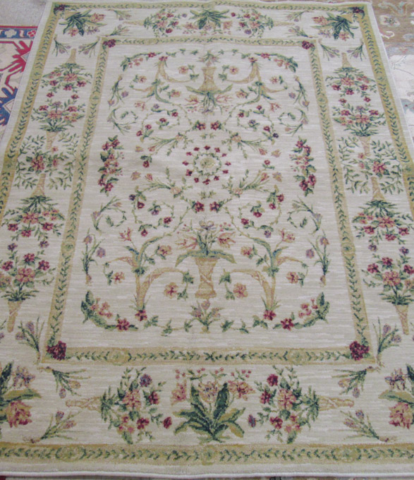 Appraisal: MACHINE WOVEN CARPET by Shaw Rug Co Fairford floral pattern