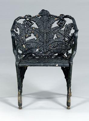 Appraisal: Victorian cast iron chair fern pattern armchair with open seat