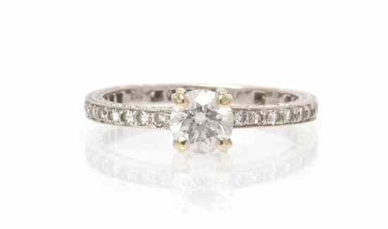 Appraisal: An Karat White Gold and Diamond Ring containing one round