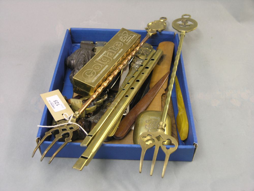 Appraisal: Metalware including two toasting forks two brass penny whistles various