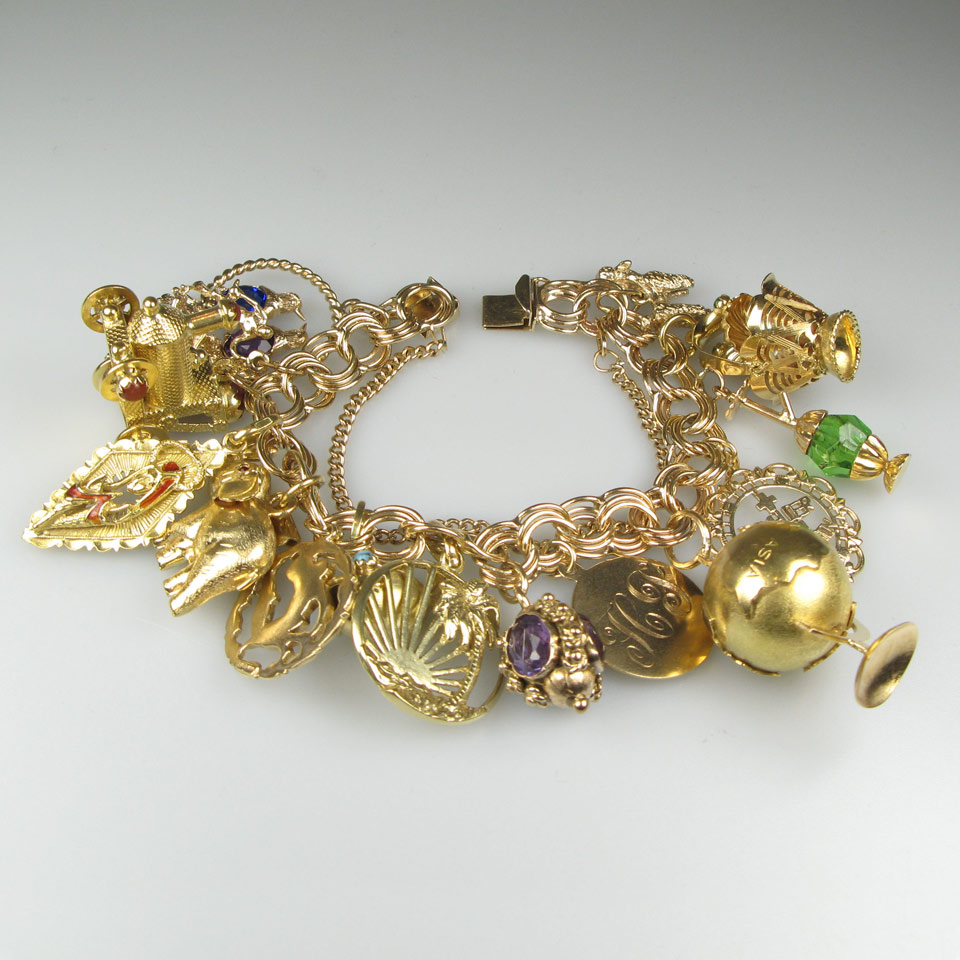 Appraisal: k Yellow Gold Charm Bracelet with various gold charms g