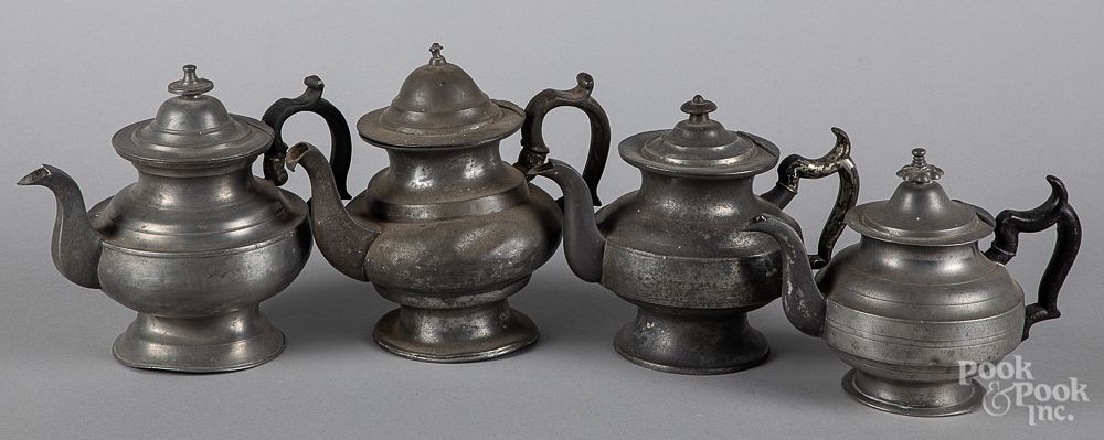 Appraisal: Four American pewter teapots th c Four American pewter teapots