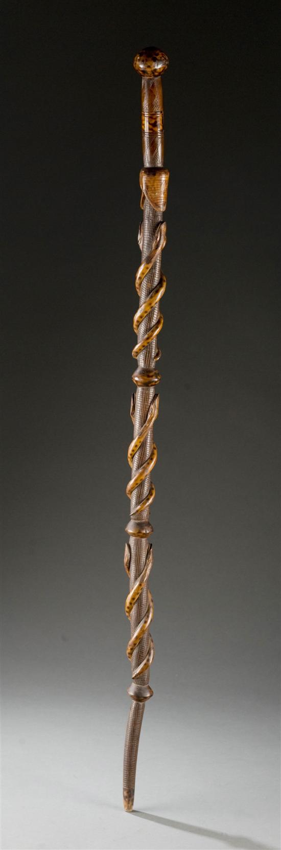 Appraisal: Folk art walking stick Late th early th century Carved