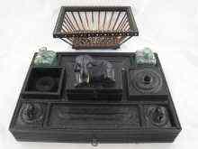 Appraisal: An Indian ebony desk inkstand with green glass pots a