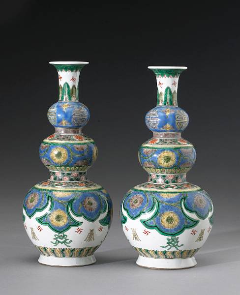 Appraisal: A pair of famille verte triple gourd vases Kangxi Marks