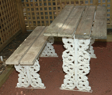 Appraisal: A CAST IRON GARDEN TABLE AND SEAT