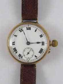 Appraisal: An unusual ct gold gent's wrist watch with front loading