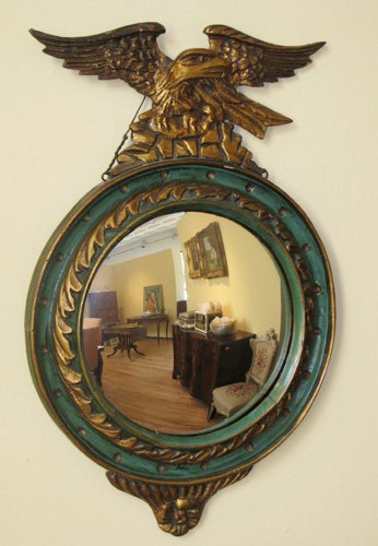 Appraisal: Artist Title Bulls eye Convex Mirror with Hand-Carved Frame Featuring